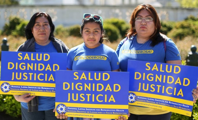 Activist for National Latina Institute for Reproductive Health march