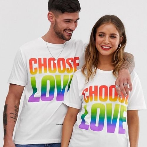 man and woman wearing a white t-shirt with the words choose love printed on from ASOS